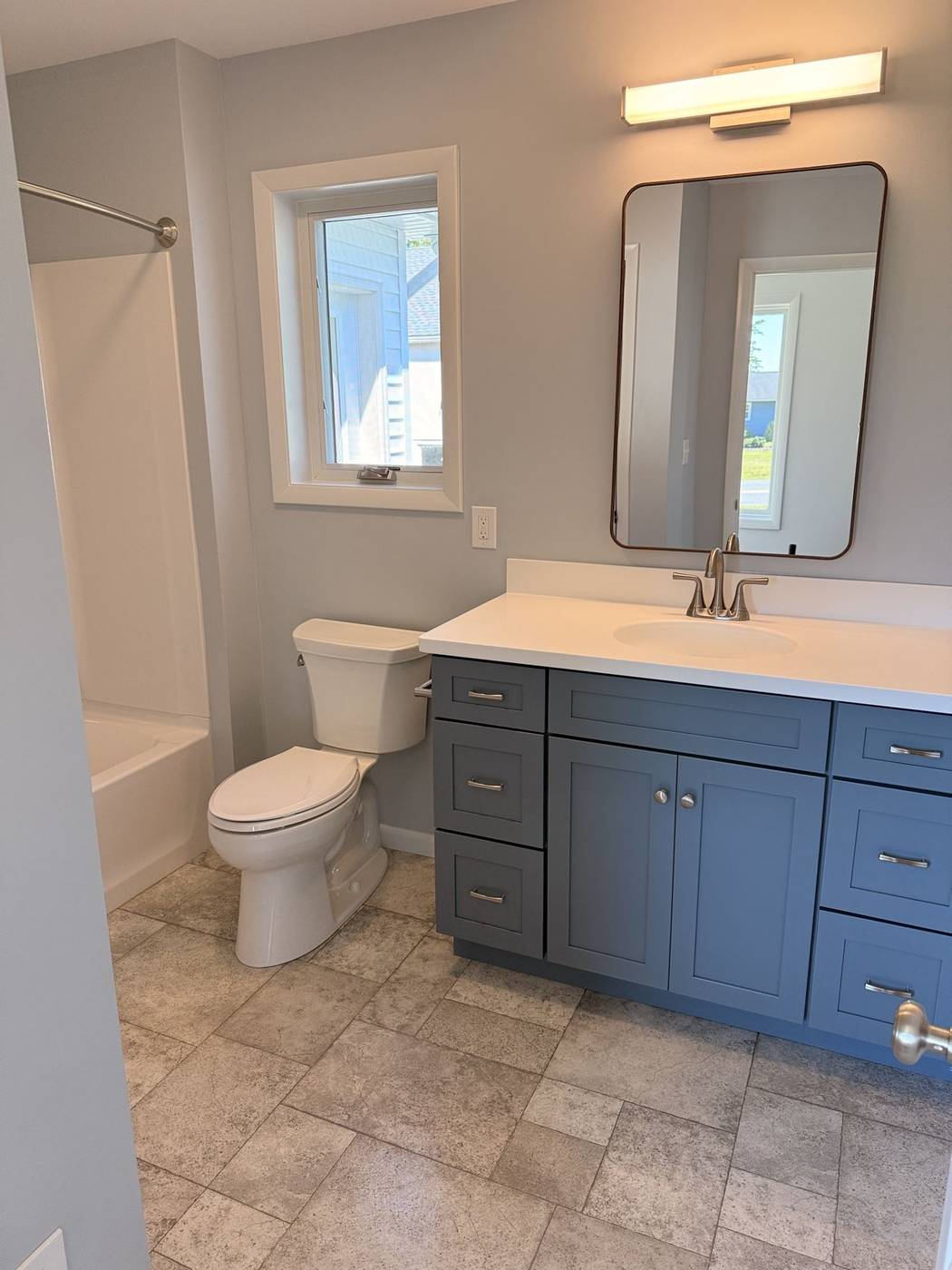 Freshly finished bathroom prepared for a post-construction clean
