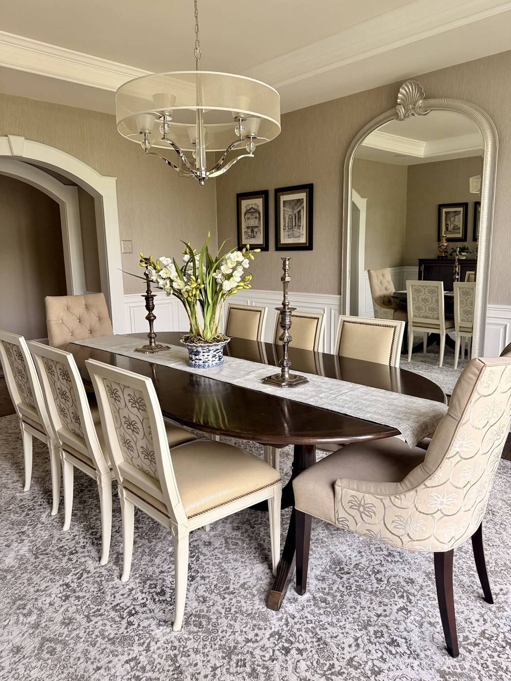 Cleaned dining room with a polished dark wood table