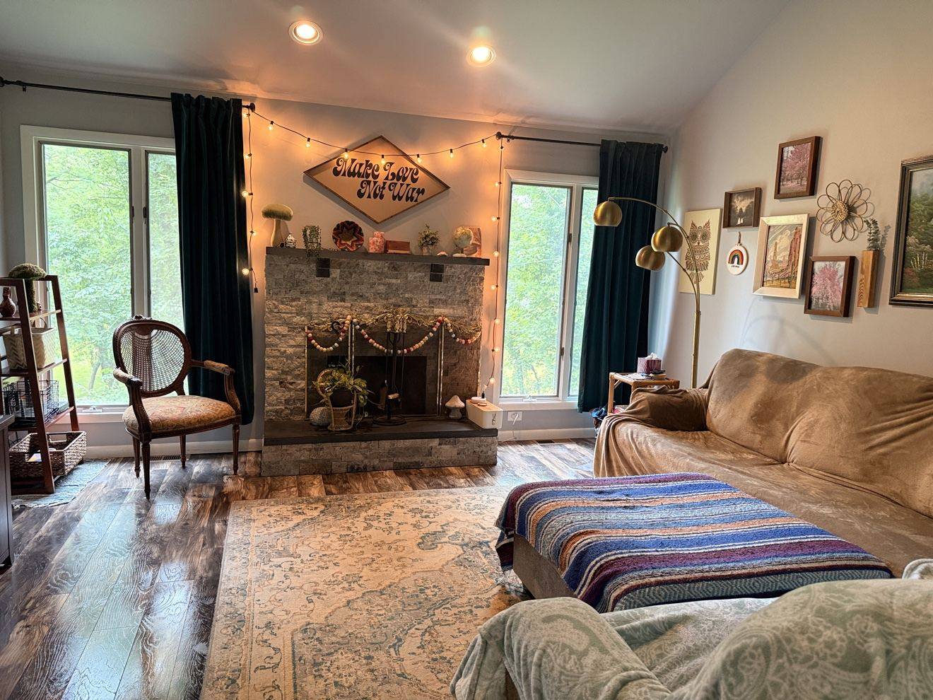 Clean living room with a fireplace and bright patio doors