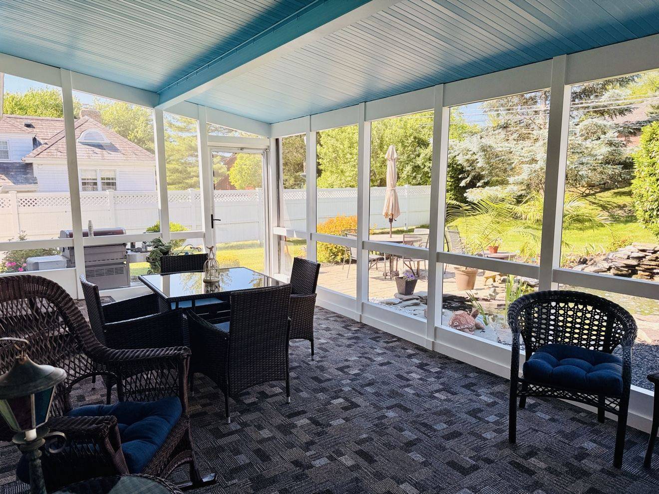 Wide view of a refreshed screened porch