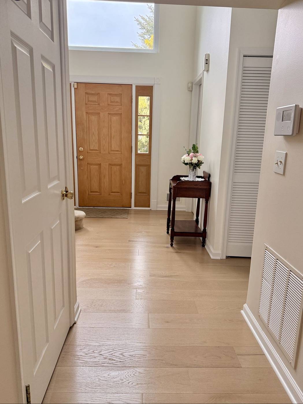 Bright, polished residential entryway