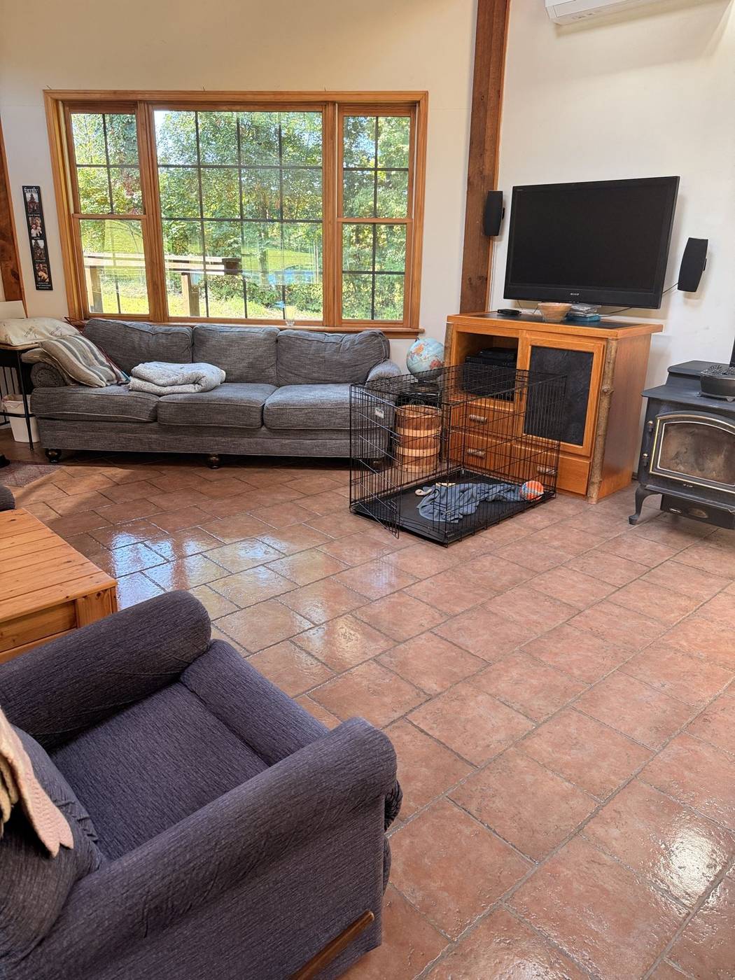Cabin living room with polished tile floors